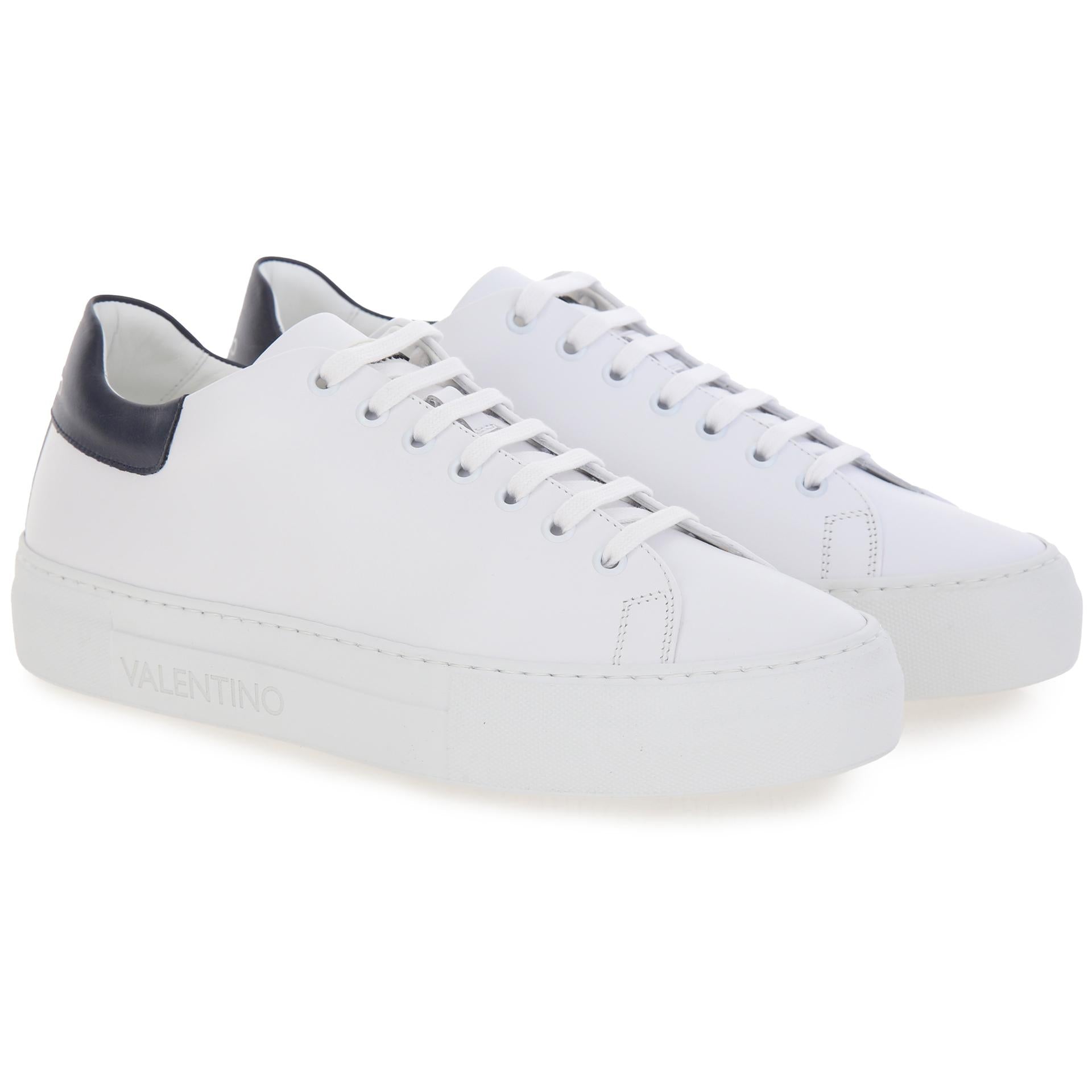 White sneakers with high sole